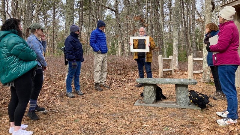 Participants on a trail learning to observe nature with intention.