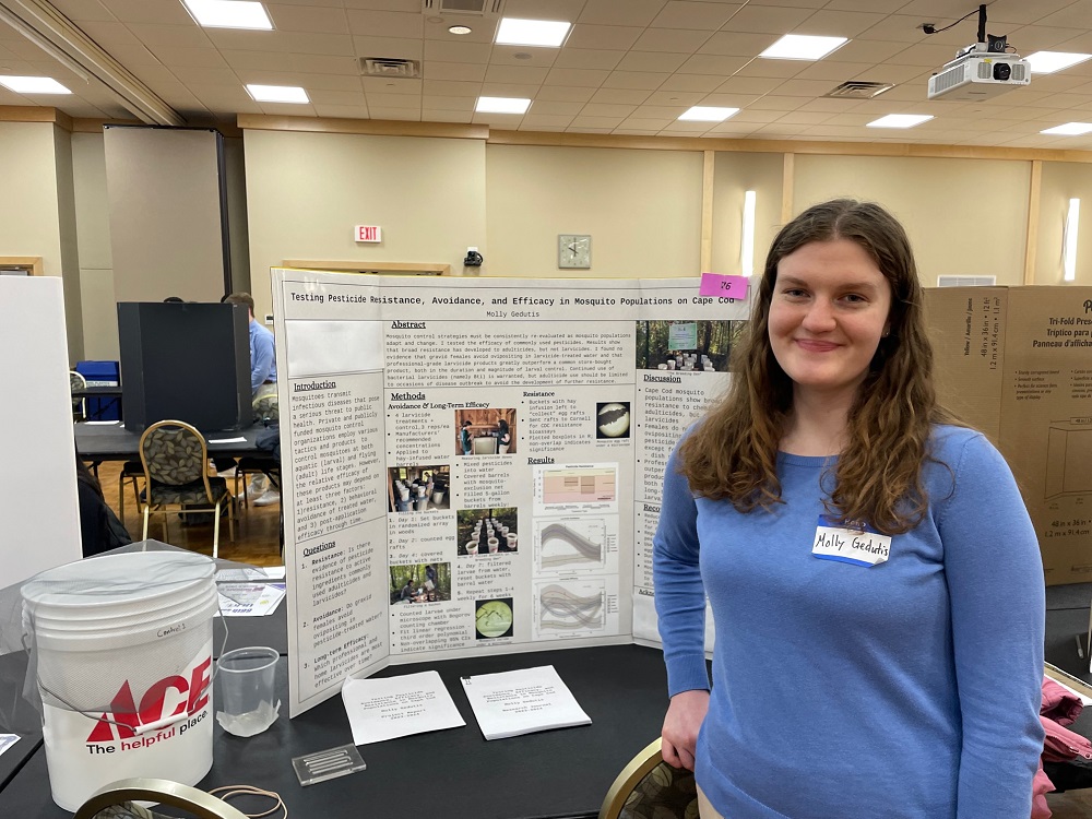 Molly presents her poster at the Regional Science Fair